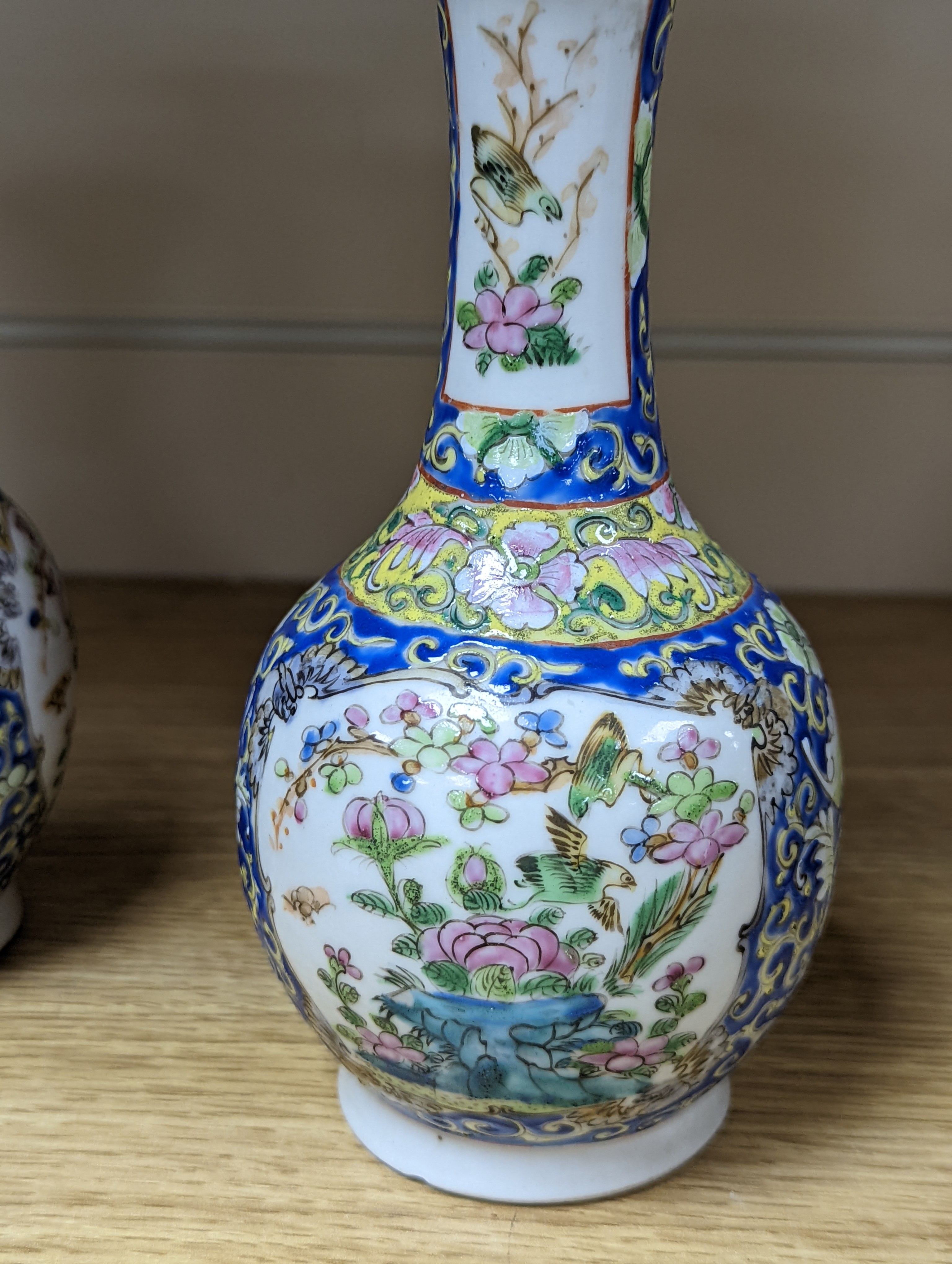 Four 19th century Chinese famille rose vases, 21cm